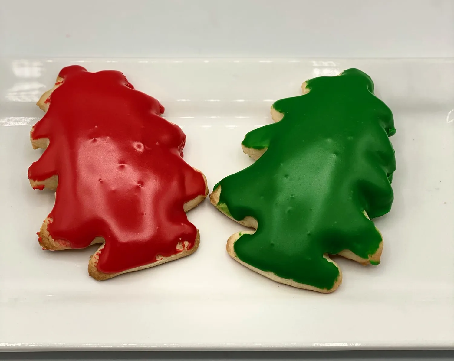 Red and green iced Christmas-tree sugar cookies